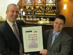 Tony Hogan of Fullers, left, with Richard Short of Penny Hydraulics, right.