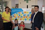 The nursery was presented with a display canvas to commemorate its success.