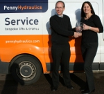 Tim Penny, Service Director at Penny Hydraulics, presents special award to Michelle Fowler, Maintenance Service Manager at Mitchells & Butlers.